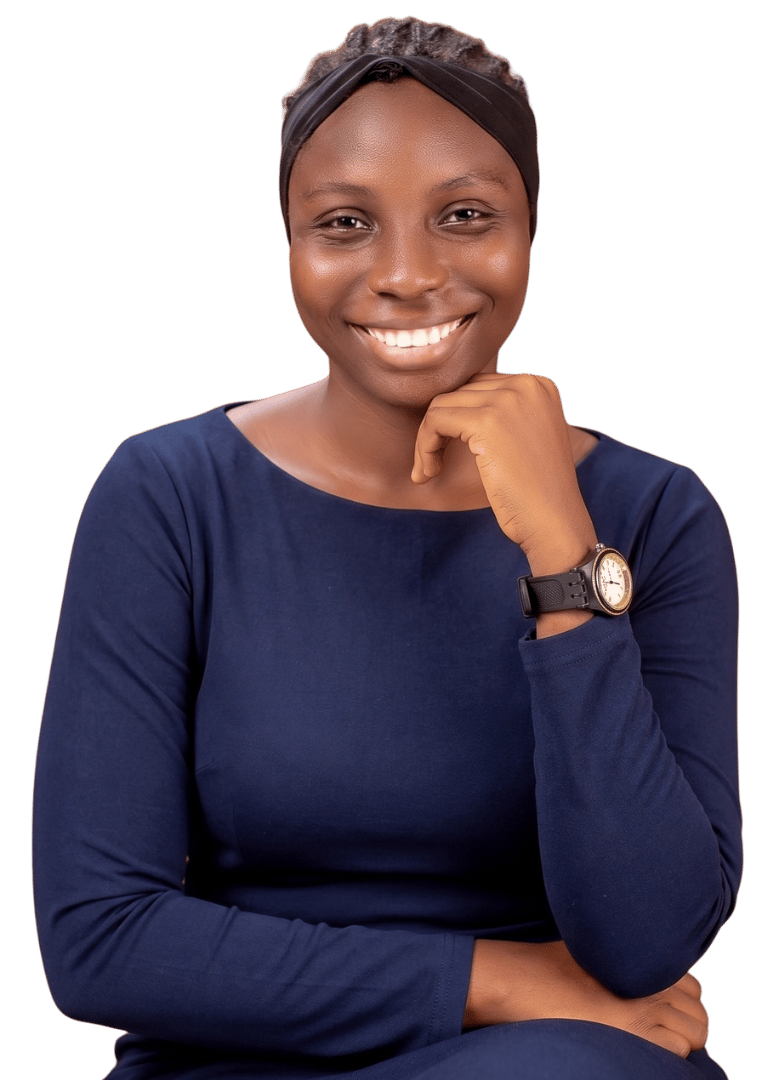 Dr. Ayomide Owodunni smiling, her chin resting on her hand